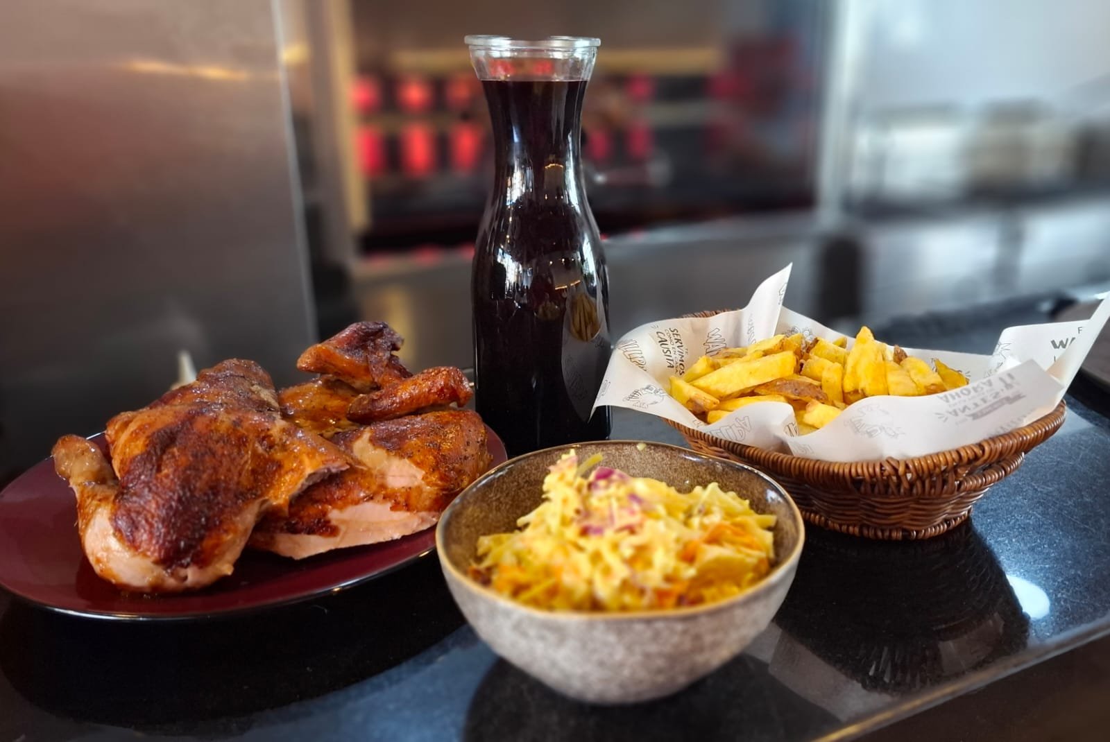 1 Pollo a la Brasa + Papas + Ens. Col + Chicha 1L